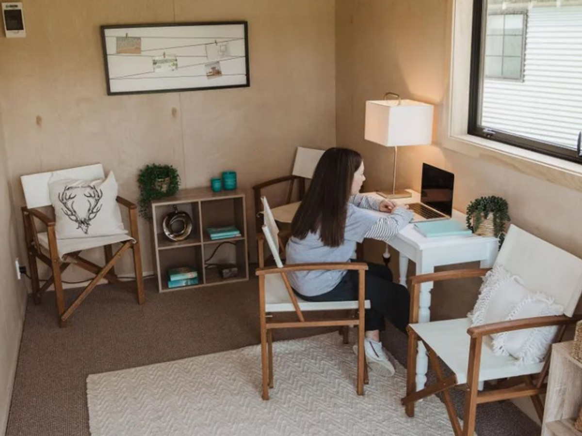 Large+ cabin office setup with seating area